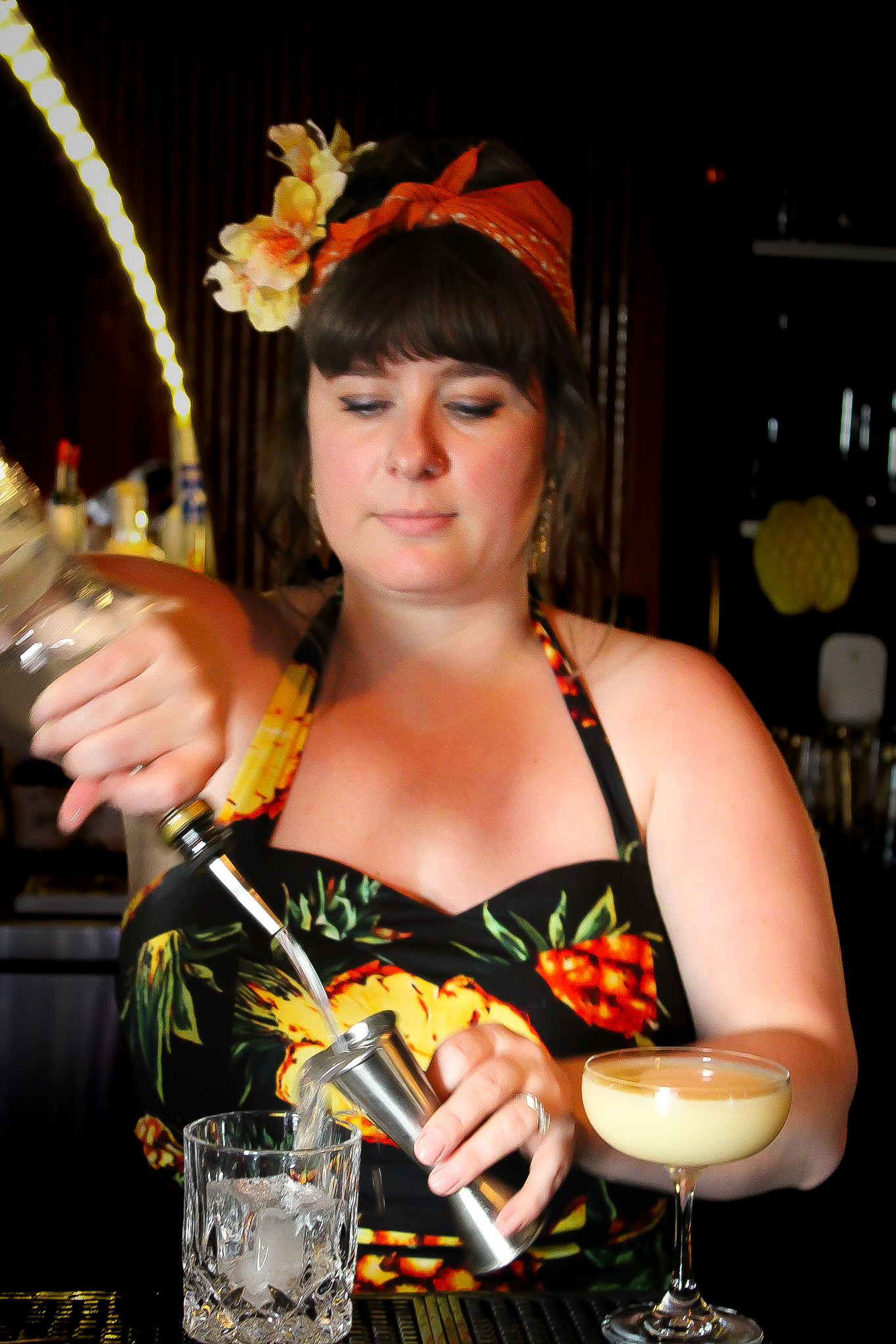 Jess crafting cocktails